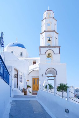 Sunset at the Greek village of Oia Santorini Greece with a view over the ocean caldera of Santorini
