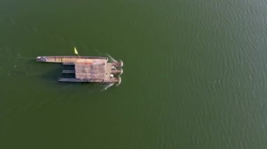 Huai Krathing lake in North Eastern Thailand Isaan region famous for its floating bamboo rafts where you can have lunch or dinner in the middle of the lake. 