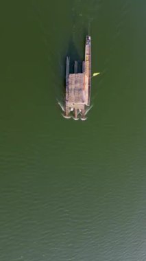 Huai Krathing lake in North Eastern Thailand Isaan region is famous for its floating bamboo rafts where you can have lunch or dinner in the middle of the lake with Thai food