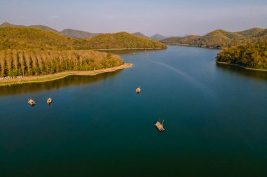Huai Krathing lake in the North Eastern Thailand Isaan region, famous for its floating bamboo rafts where you can have lunch or dinner in the middle of the lake. 