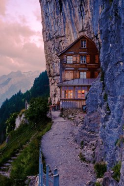 Berggasthaus Aescher in den Appenzeller Alpen, restaurant under a cliff on Ebenalp in Swiss, Appenzell June 2021
