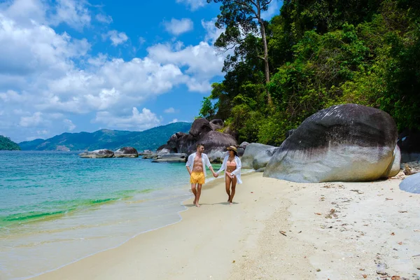 stock image couple on beach in swimwear at Koh Adang Island near Koh Lipe Island Southern Thailand with turqouse colored ocean and white sandy beach Tarutao National Park