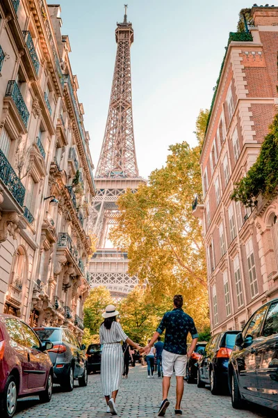 stock image couple men and woman honeymoon Paris Eiffel tower France, couple men and woman city trip in Paris during summer