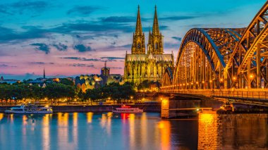 Cologne Koln Germany during sunset, Cologne bridge with the cathedral. beautiful sunset at the Rhine river