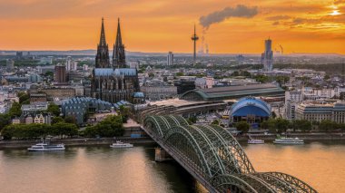 Cologne Koln Germany during sunset, Cologne bridge with the cathedral. beautiful sunset at the Rhine river