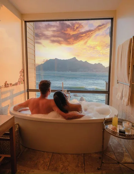 Couple Men Women Bathtub Looking Out Ocean Cape Town South — Stock Photo, Image