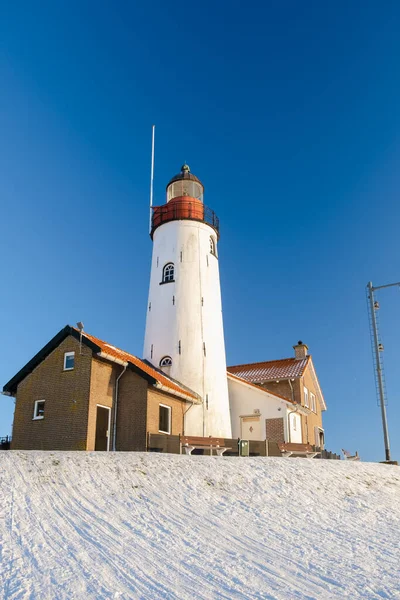 Latarnia Morska Urk Holandia Zimą Śniegiem Holandii Błękitnym Niebem — Zdjęcie stockowe