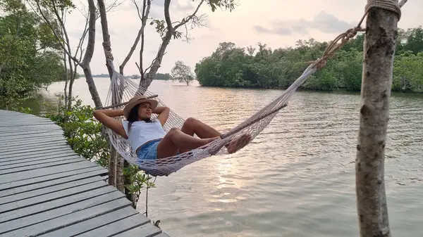 Woman Peacefully Relaxes Hammock Gently Swaying Back Forth Wooden Dock — Stock Photo, Image