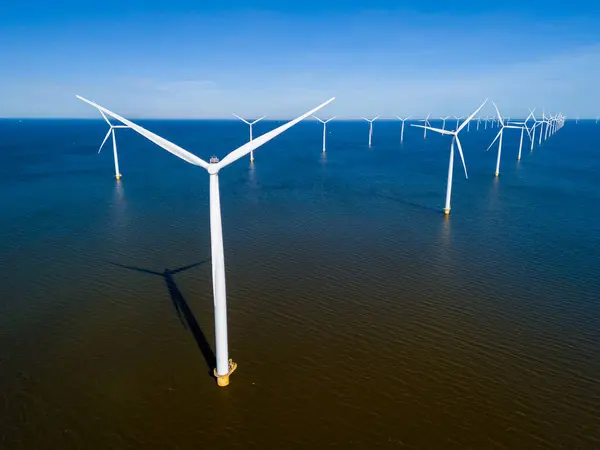 Cluster Wind Turbines Stands Tall Ocean Power Wind Rotate Backdrop — Stock Photo, Image