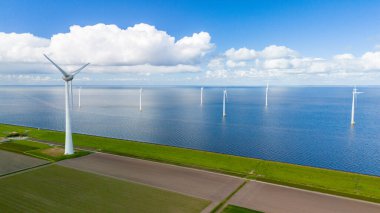 A wind farm filled with turbines in the ocean of the Netherlands, harnessing the power of the wind to generate clean energy. in the Noordoostpolder Netherlands, windmill turbines at sea clipart