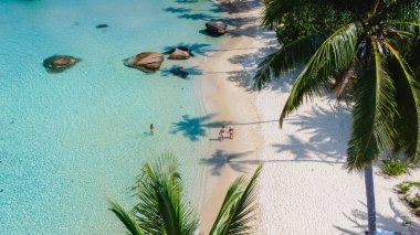 Rahatlamak ve kaçmak için ideal bir yer olan Koh Kood Adası, Tayland 'daki sakin bir plajın nefes kesen manzarasını ve şaşırtıcı derecede berrak suları tecrübe edin.