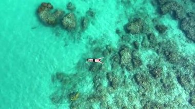 Tayland 'da kristal berrak suların çarpıcı mercan resifleriyle buluştuğu Koh Kood Adası' nın güzelliğini tecrübe edin..