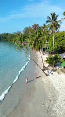 Tayland 'daki Koh Kood Adası' nın dingin güzelliğini deneyimleyin. Nazik dalgaların el değmemiş kıyılara çarptığı yer..