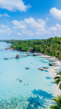 Tayland 'daki Koh Kood Adası' nın enfes hava manzaralarını keşfedin. Saf plajları, berrak turkuaz suları ve yemyeşil yemyeşil bir cennet sizi bekliyor.
