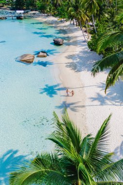 Tayland, Koh Kood Adası 'ndaki berrak turkuaz suları ve yemyeşil yemyeşil havanın tadını çıkarın. Seyahat meraklıları ve doğa severler için ideal.