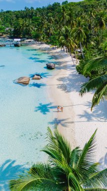 Gelin ve Tayland 'daki Koh Kood Adası' nın nefes kesici güzelliğini keşfedin. Mükemmel bir kaçış sağlayan el değmemiş plajları, berrak suları ve yemyeşil suları.
