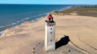 Jutland Danimarka 'nın çarpıcı sahil şeridini keşfedin, Rubjerg Knude Fyr Deniz feneri