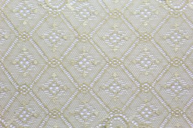 Dantelli kumaşın makro fotoğrafı.