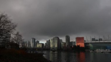 Copper building in Vancouver downtown timelapse on cloudy evening