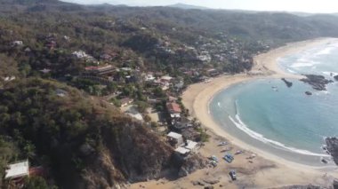 Enjoy a spectacular 4K drone view of Oaxaca's ocean and beaches on a sunny day.