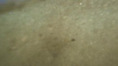 The power of sea is on full display in slow motion and line between underwater