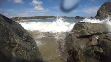 Mesmerizing slow-motion footage of water cascading over rocks