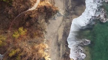 Crystal-clear waters meet pristine sandy beaches