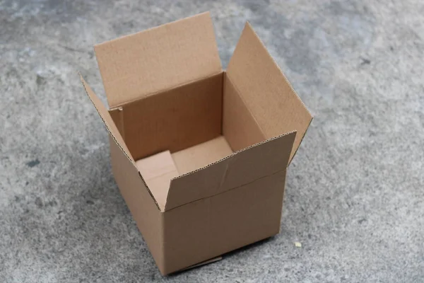 photo of brown cardboard box open top