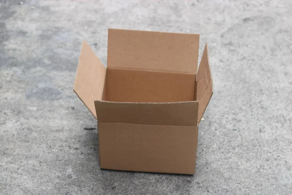 photo of brown cardboard box open top