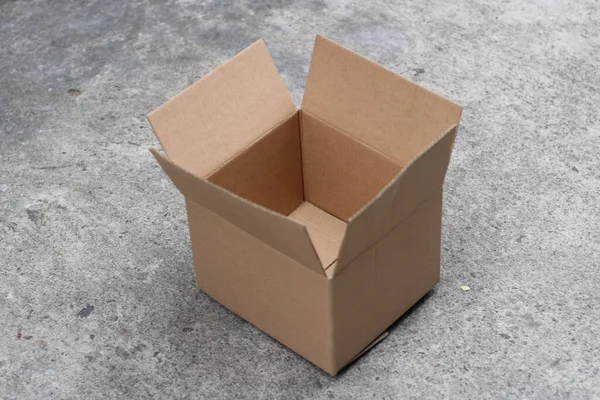 photo of brown cardboard box open top