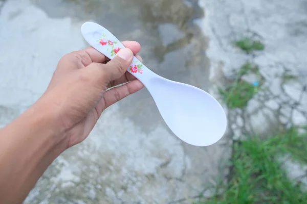 Photo White Spoon Held Hand — Stock Photo, Image