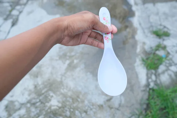 Photo White Spoon Held Hand — Stock Photo, Image