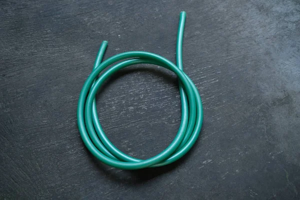 Photo Green Water Hose Roll — Stock Photo, Image