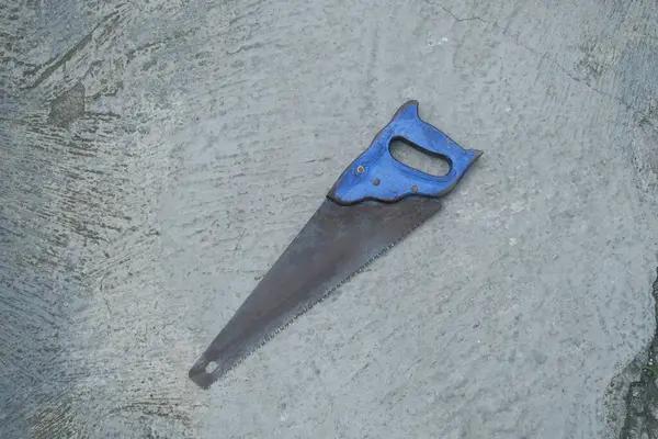 stock image photo of an old hacksaw