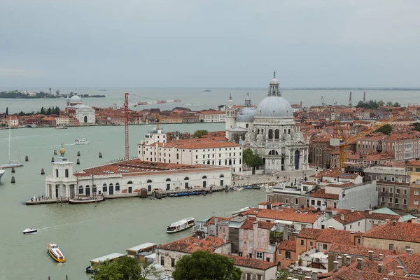 stock image Venice, Italy - May 13, 2012: Beholding the breathtaking panorama of Venice, with its meandering canals, historic bridges, and vibrant rooftops, as seen from a lofty vantage point in Italy, is an experience that captivates and inspires