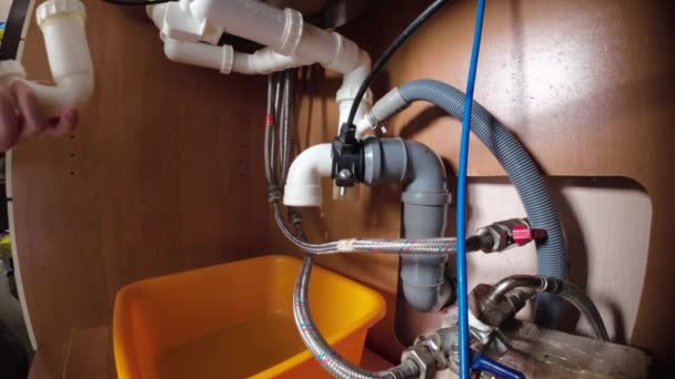 Man Fixes Water Leak His Own Unscrews Part Drain Pipe — Stock Video