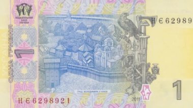 Ukrayna 'nın, Ukrayna' nın zengin mirasını ve modern para birimini ön plana çıkaran, kiliseler ve kale duvarlarıyla Vladimir 'in Kyiv kentinin tarihi manzarasını gözler önüne seren tek bir Hryvnia banknotunun ayrıntılı görüntüsü.