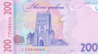 Ukrayna 'nın dinamik zoom görüntüsü 200 Hryvnia ters tarafı Lutsk Kalesi' nin ortaçağ geçit kulesinin görüntüsü, detaylı Gotik mimari ve koruyucu tasarım unsurları sergilenmektedir.