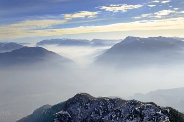 Inverse weather - Monte Bondone mountain group in winter, Trento region, Trentino, Italian Alps