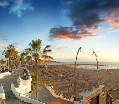 Beach in the tourist resort Playa de las Americas, Tenerife island, Canary Islands, Spain