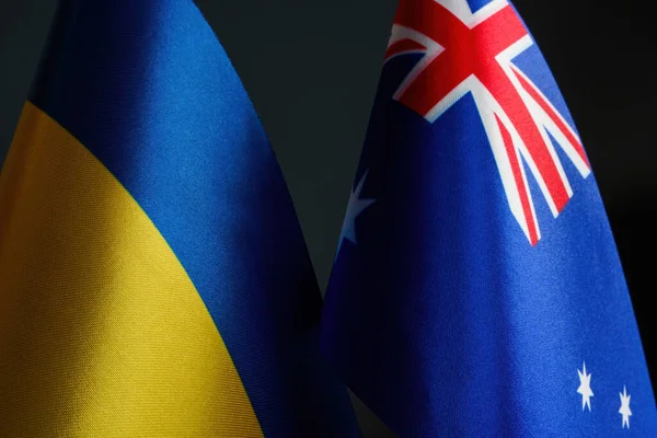 Vlaggen Van Oekraïne Australië Als Symbool Van Samenwerking Liggen Buurt — Stockfoto