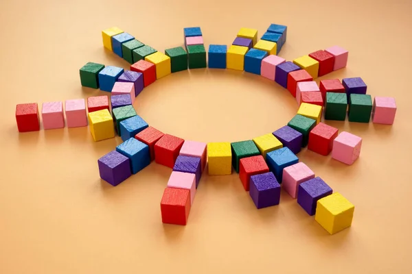 Circle of colored cubes as an abstract concept of interaction, management and connections.