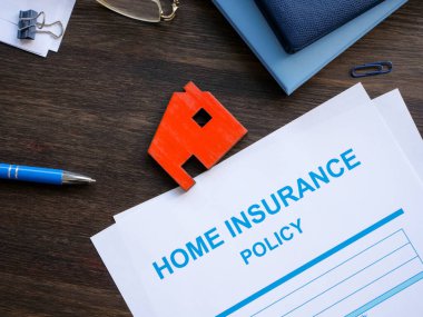 Home insurance policy and model of home. clipart