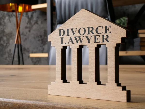 Divorce lawyer plate on the office table.