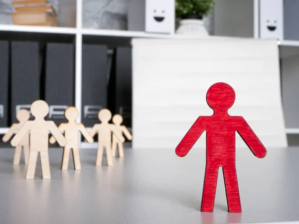 Human capital. Figures on the office desk. Career development and leadership concept.