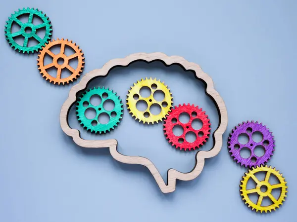 Brain and colored gears. New ideas and creativity concept.