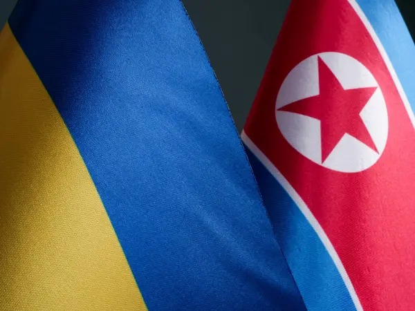 The flag of Ukraine and flag of North Korea.