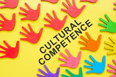 Cultural competence words and colored palms. clipart