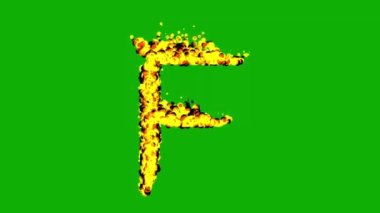 Yeşil ekran arka planında ateş efektli İngilizce alfabe F
