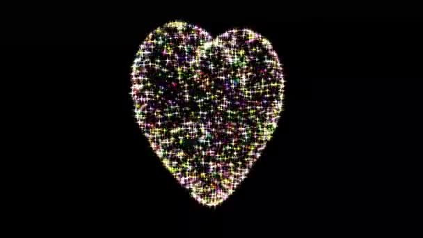 Spinning Corazón Con Brillo Colores Brilla Sobre Fondo Negro Liso — Vídeo de stock